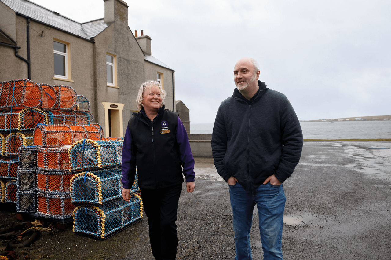 Flying banker NatWest colleague with customer in Orkney Islands